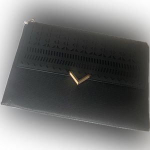 Stella and Dot Black envelope clutch with gold crossbody strap